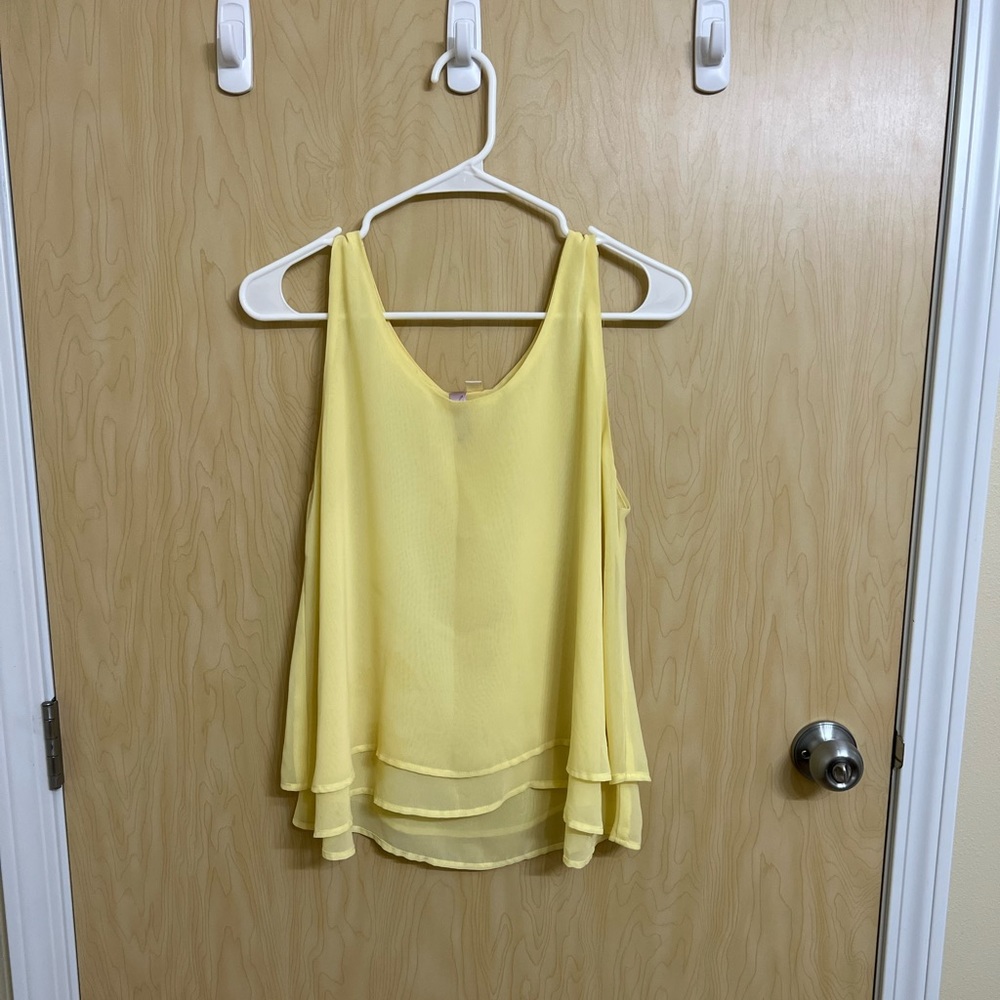Francesca’s yellow flowy tank top. Worn only a couple of times.